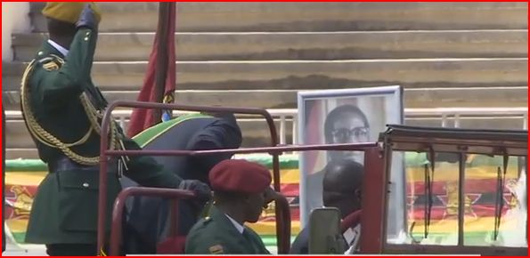 VIDEO: Mugabe bows down to own portrait at National Sports Stadium