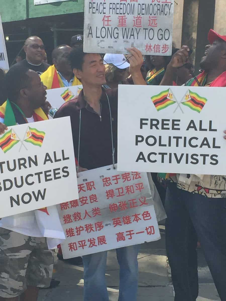 Chinese Man ‘Ken Chang Liang’ attacks Mugabe in Harare Protest Demo, Message Translation