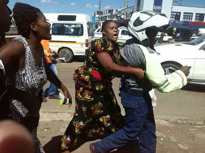 Pictures: Zim ‘ZRP policeman’ snatches baby after parents fail to pay fine