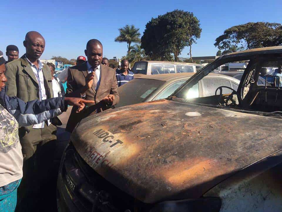  Burning of opposition cars raises violence concerns