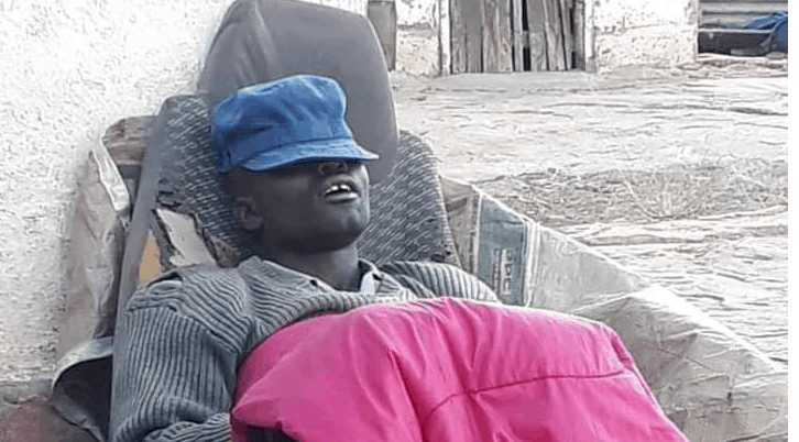 PIC: Mouth Ajar… Sleeping ZRP Officer Causes Social Media Frenzy