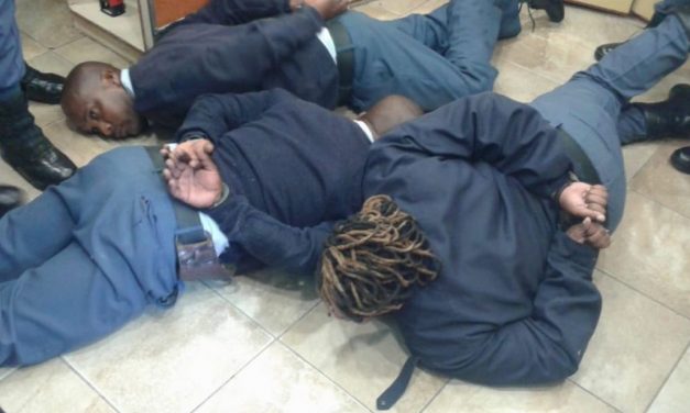 South African police officers arrested for drinking while on duty..PICTURES