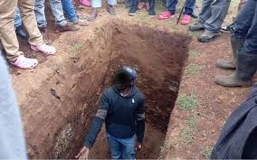Man forced to exhume wife’s body