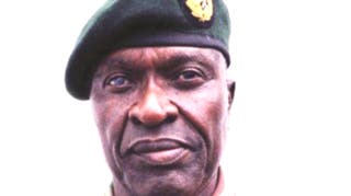 Decorated soldier declared national hero after burial