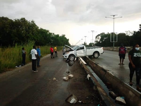 Vehicle overturns after driver fails to negotiate roundabout on Airport Road..PICTURES