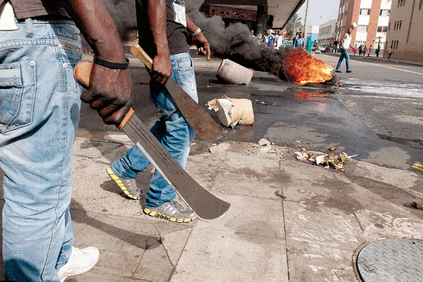 One dies, 8 injured after attack by 15 member machete gang