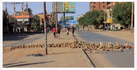 Roads in Sudan’s capital barricaded as strike against protest deaths starts