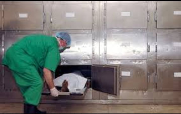 HORROR: AS woman sent to mortuary in body bag is found to be alive