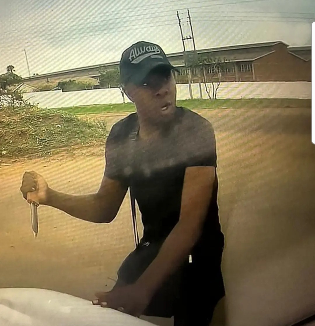 VIDEO: Armed robbers caught on camera robbing motorist in Zimbabwe