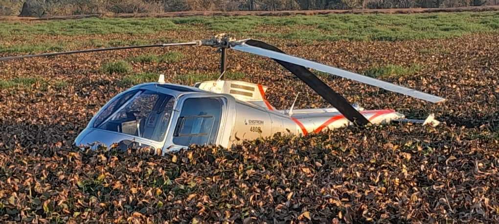 Helicopter lands in sewage pond after engine failure