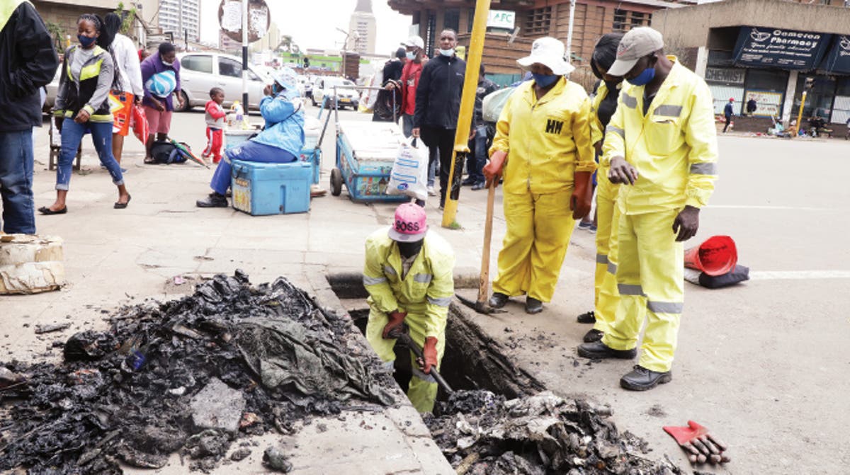 2 council workers suffocate while cleaning storm drain